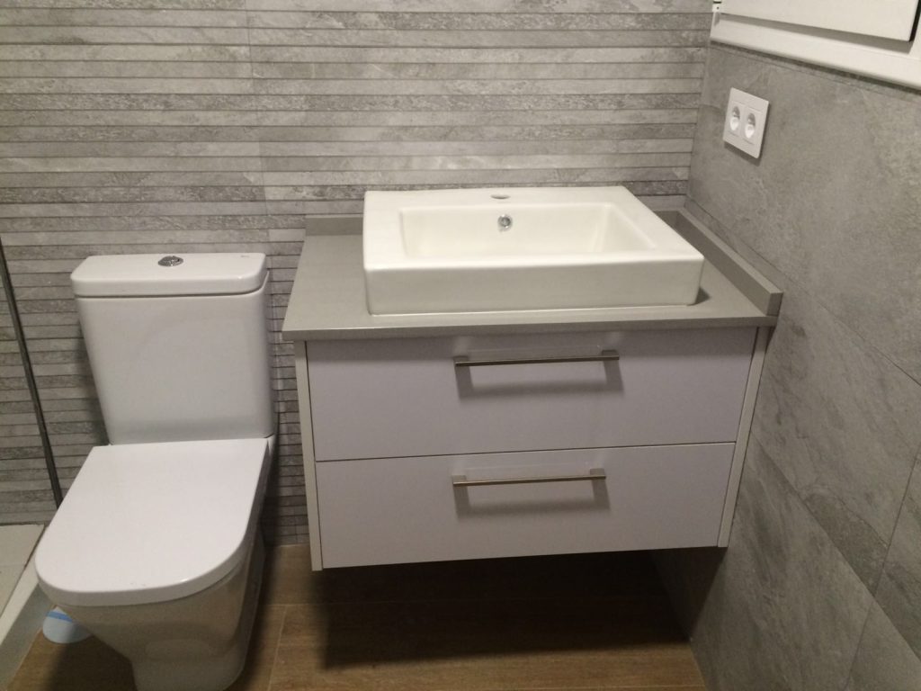 Mueble de baño con un lavabo